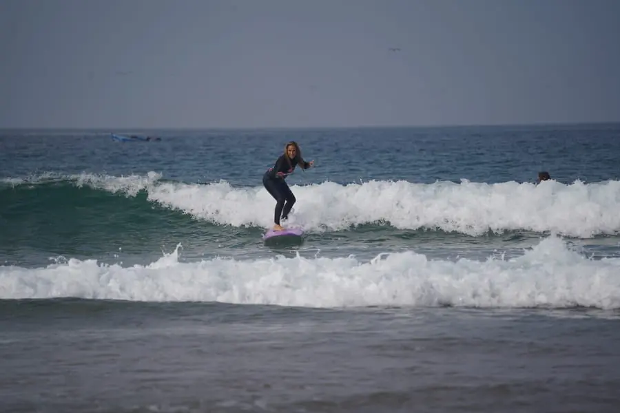 A Vibe guest surfing an Atlantic wave
